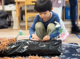 さつまいもの苗を斜めに植える体験